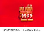 gifts on a red background | Shutterstock . vector #1235291113