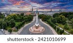 Small photo of Riga, Latvia. June 10, 2023. Monument of Freedom in Riga, Latvia. Beautiful sunset view in Riga by the statue of liberty - Milda. Freedom in Latvia. Statue of liberty holding three stars over the city