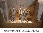 Small photo of Xian, Shaanxi Provice, China, Asia - 10 26 2009 : detail photo of the famous chinese Terracota army in Xi'an but with beheaded broken destroyed soldiers in dry soil earth dust