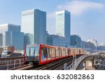 Docklands light railway in London with Canary Wharf in the background