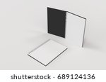 Two Opened Blank Notebooks With ...