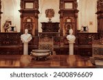 Small photo of Sinaia, Romania – November 01, 2023: Peles Castle interior with busts of King Carol I of Romania and consort Queen Elisabeth of Wied.