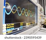 Small photo of Oscilloscope measuring sine wave, alternate current, eletronic analogic, double wave, phase