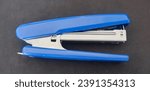 Small photo of Staplers hold paper together asa stapler, usually used in an office