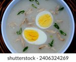Small photo of “Arroz Caldo” is the Filipino’s version of congee, this gruel dish is of Chinese origin and adapted by the Spanish colonial settlers who regularly visited the Chinese eateries.