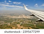 Small photo of Perched in the snug embrace of an airplane passenger seat, a world of wonder unfolds outside the window. As the aircraft ascends above the clouds, the monotony of everyday life gives way to a breathta