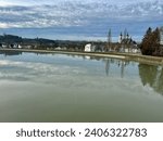 Small photo of The city and the firmament in the mirror of the river Enns