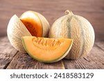 Small photo of Yubari King Melon: Grown in Japan, the Yubari King Melon is a highly prized and rare variety of cantaloupe known for its sweetness and perfect round shape. It is often given as a luxury gift.