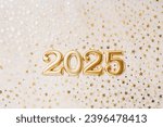 Holiday background Happy New Year 2025. Numbers of year 2025 made by gold candles on bokeh festive sparkling background. celebrating New Year holiday, close-up. Space for text