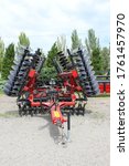 Small photo of Kyiv, Ukraine - June 16, 2020: Large disc harrow Case IH RMX 370 , towing for tractors to plow fields, against the sky at Kyiv, Ukraine on June 16, 2020