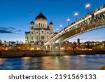 Small photo of Russia, Moscow - May 9, 2022: View Cathedral Of Christ The Savior and the Patriarchal Bridge tonight.