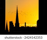 Silhouette of church steeple at ...
