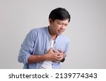 Small photo of Men have chest pain caused by heart disease, heart attack, heart leakage, coronary heart disease,Hypertension,health care and medical concept