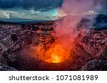 Volcano crater eruption with...