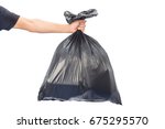 Man hands holding garbage bag isolated on white background.

