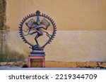 Small photo of Bronze dancing Shiva. Toned photo with space for text. Dancing God Shiva Nadarajah Statue