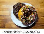 Small photo of Two different Indonesia donuts flavor, chocolate and rainbow flick