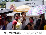 Small photo of Guwahati, India. 25 August 2020. People flout social distancing norms as they stand in a queue to register for Aadhar cards, amid the ongoing COVID-19 coronavirus pandemic, in Guwahati