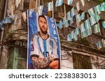Small photo of KOLKATA, INDIA - DECEMBER 12: A poster of Lionel Messi at a street decked up with FIFA World Cup 2022 theme, during Qatar World Cup 2022 on December 12, 2022 in Kolkata, India.
