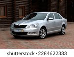 Small photo of Vinnytsia, Ukraine; March 18, 2023. Grey Skoda Octavia A5 at the parking. Skoda Octavia A5 in the city street. Front left view.