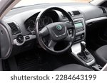 Small photo of Vinnytsia, Ukraine; March 18, 2023. Skoda Octavia steering wheel. Skoda Octavia A5 driver and passenger seat. Skoda Octavia A5 interior. Skoda Octavia A5 dashboard.