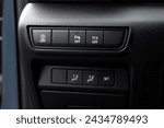 Driver Knee Pad Panel modern car. ESP off Switch. Car light switch. Control buttons combination Details. Dimming light button.