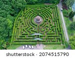 Small photo of Valeggio sul Mincio, Verona, Italy - 08.02.2021: Aerial view of the maze of Garden park Sigurta. Concept of getting lost in a maze (labyrinth).
