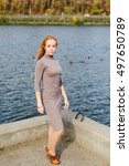 Redhead Young Woman Posing In...