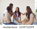 Small photo of Multiracial friends talking to young girl and giving her life advice. Diverse women in female support group helping each other, discussing problems and learning to have self esteem and know self worth