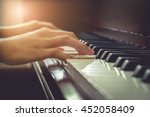 Musician Playing Piano In...