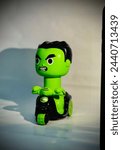 Small photo of Hulk Toy with a bike