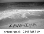 Small photo of Lahaina. Lahaina Hawaii. The name LAHAINA written in the sand on the beach with the Pacific Ocean background. Lahaina, Maui Hawaii. Hawaiian Tragedy. Town Name in the Hawaiian Beach Sand.
