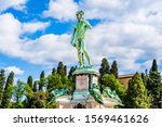 Florence, Tuscany , Italy: Copy of the statue of David at Piazzale Michelangelo. Text translation: 