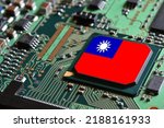 Flag of the Republic of China or Taiwan on semiconductor chip or microchip on a motherboard. Taiwan manufacturing chip industry battle between US - China.