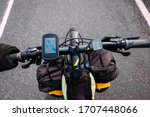 tourist bike steering wheel with backpacks and map in iceland navigator number one highway in summer