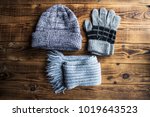 A Grey Winter Hat Gloves Scarf...