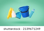 Small photo of Levitating creative cleaning kit on a green background. The concept of cleaning the premises.
