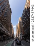 Small photo of New York City, New York. USA. July 11th 2023. The buildings at the 35th St, between 8th and 9th Avenue in Manhattan.