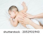 Cute Baby Massage Back In Bed ...