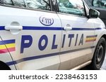 Police patrol car in Romania. Side view of a police car with the lettering 