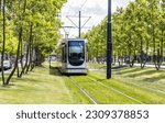 Tram in the city center  green...