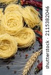 italian uncooked capellini... | Shutterstock . vector #2115382046
