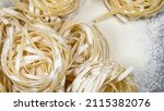  italian uncooked tagliatelle... | Shutterstock . vector #2115382076