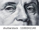 Benjamin Franklin's look on a hundred dollar bill. Benjamin Franklin portrait macro usa dollar banknote or bill