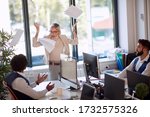 Small photo of Businesswoman getting angry at a coworker. Businesswoman throwing the papers in rage. Hostile environment.