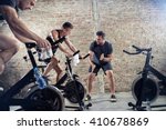
Fit young people on exercise bicycle 