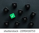 Small photo of Finding the right solution or to find the correct answer. Approval. Voting yes. Best decision, choice or option. Check mark and cross symbols on black cubes.