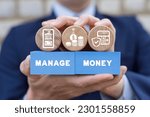 Businessman holding colorful blocks with icons and inscription: MANAGE MONEY. Concept of money management, financial investment, market movement. Manage money through your mobile phone, applications.