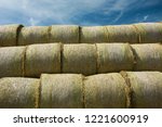 Hay Bales Stacked Against A...