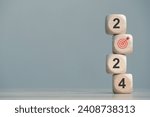 2024 Happy New year background banner. dices target icon on wooden block with  key performance indicator and business achievement goal concept. 